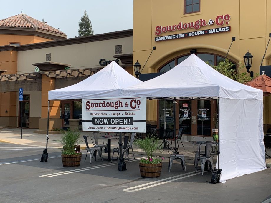 The inviting entrance of Roseville Sierra College Sourdough & Co. showcasing a menu focused on the best sandwiches, soups, and salads