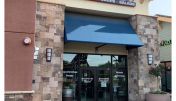 The inviting entrance of Petaluma Sourdough & Co. showcasing a menu focused on the best sandwiches, soups, and salads