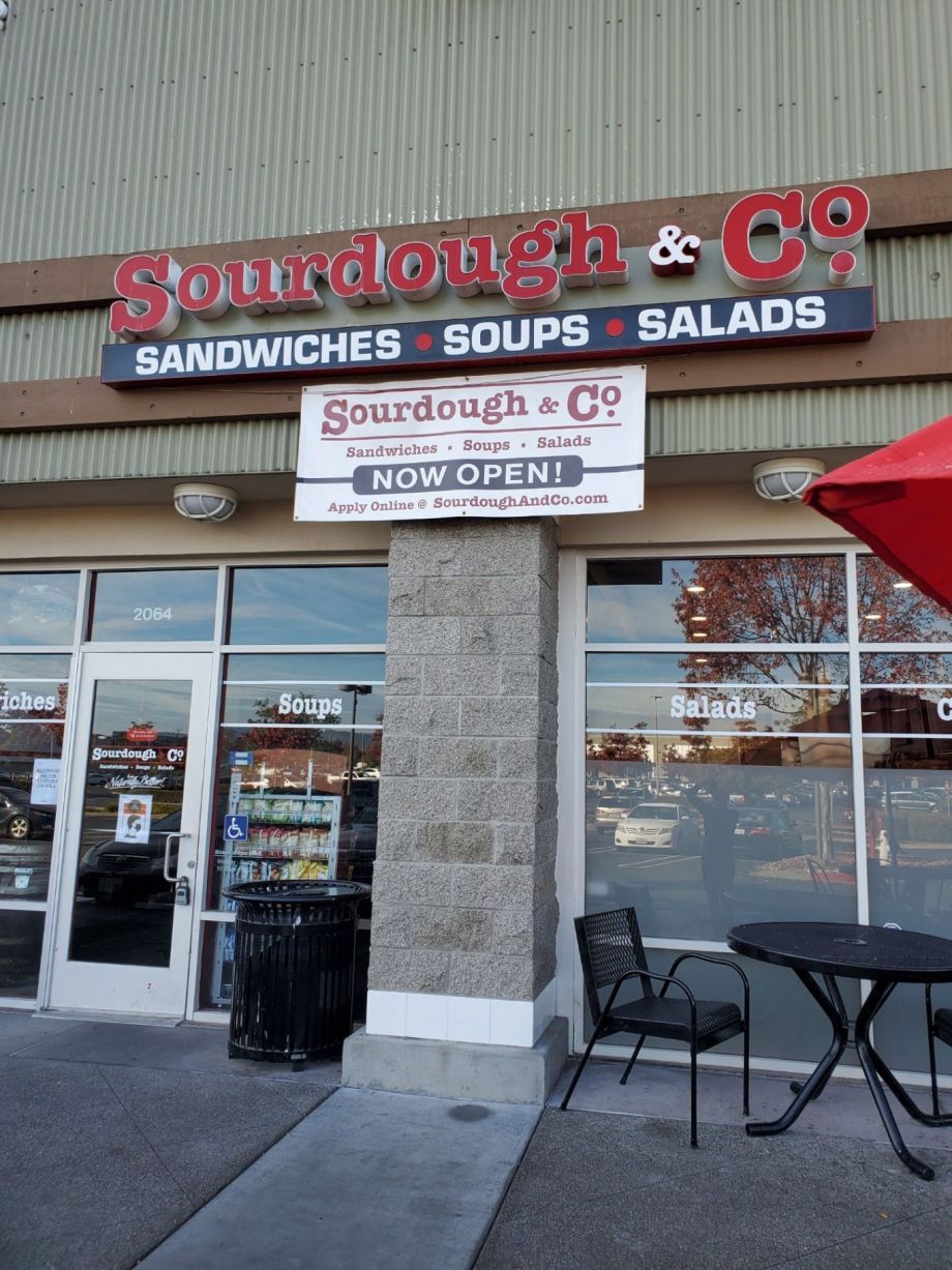 The inviting entrance of Santa Rosa Sourdough & Co. showcasing a menu focused on the best sandwiches, soups, and salads