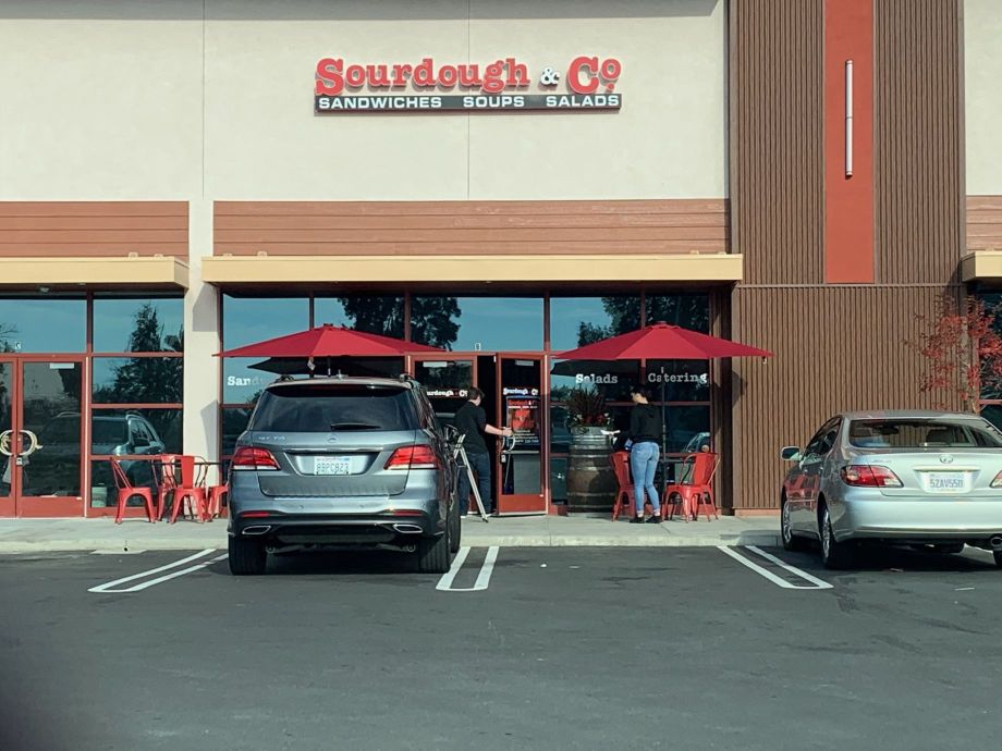 The inviting entrance of Fairfield Texas Blvd Sourdough & Co. showcasing a menu focused on the best sandwiches, soups, and salads