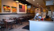 The inviting interior of Avondale Sourdough & Co. showcasing a menu focused on the best sandwiches, soups, and salads