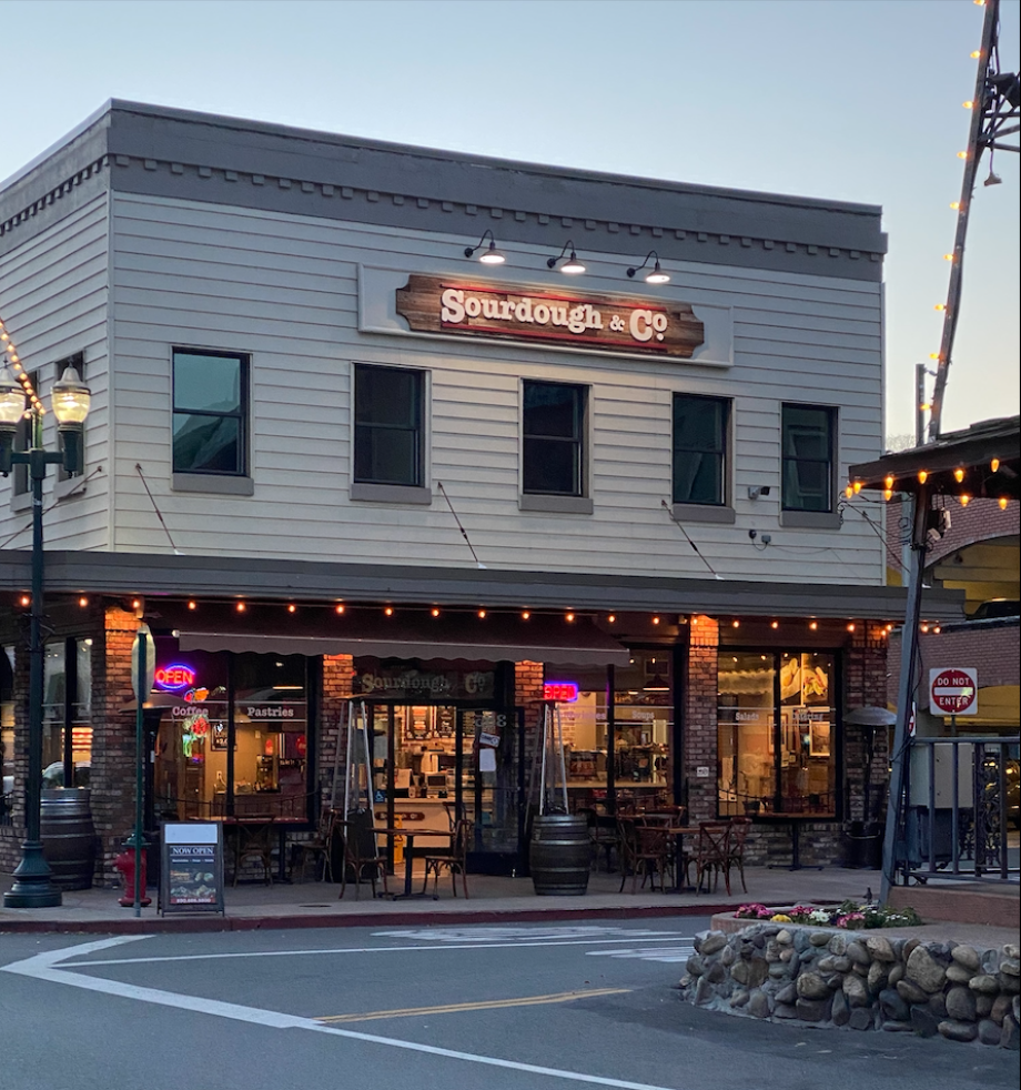 The inviting entrance of Placerville Sourdough & Co. showcasing a menu focused on the best sandwiches, soups, and salads