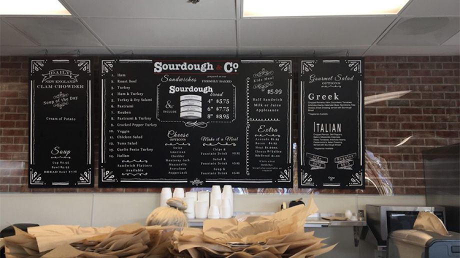 The inviting entrance of Folsom Sourdough & Co. showcasing a menu focused on the best sandwiches, soups, and salads