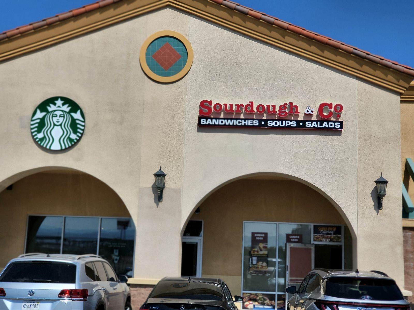 The inviting entrance of Las Vegas Sourdough & Co. showcasing a menu focused on the best sandwiches, soups, and salads